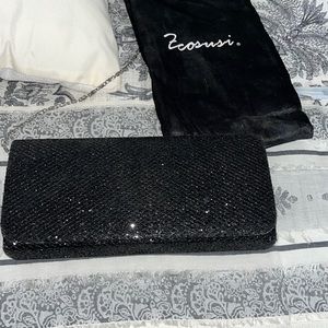 Black clutch never used!